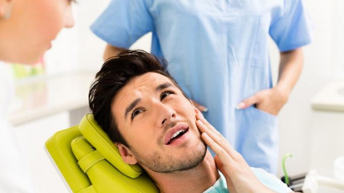 the-dentist-who-treats-dental-pain-is