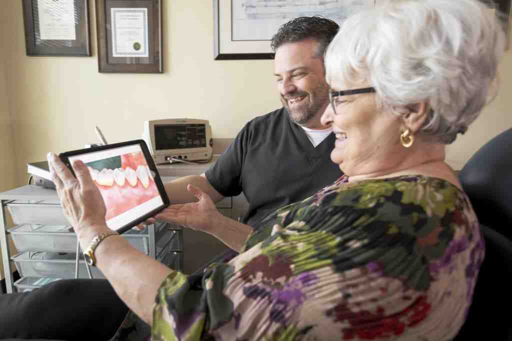 How can I get a loan for dental implants?