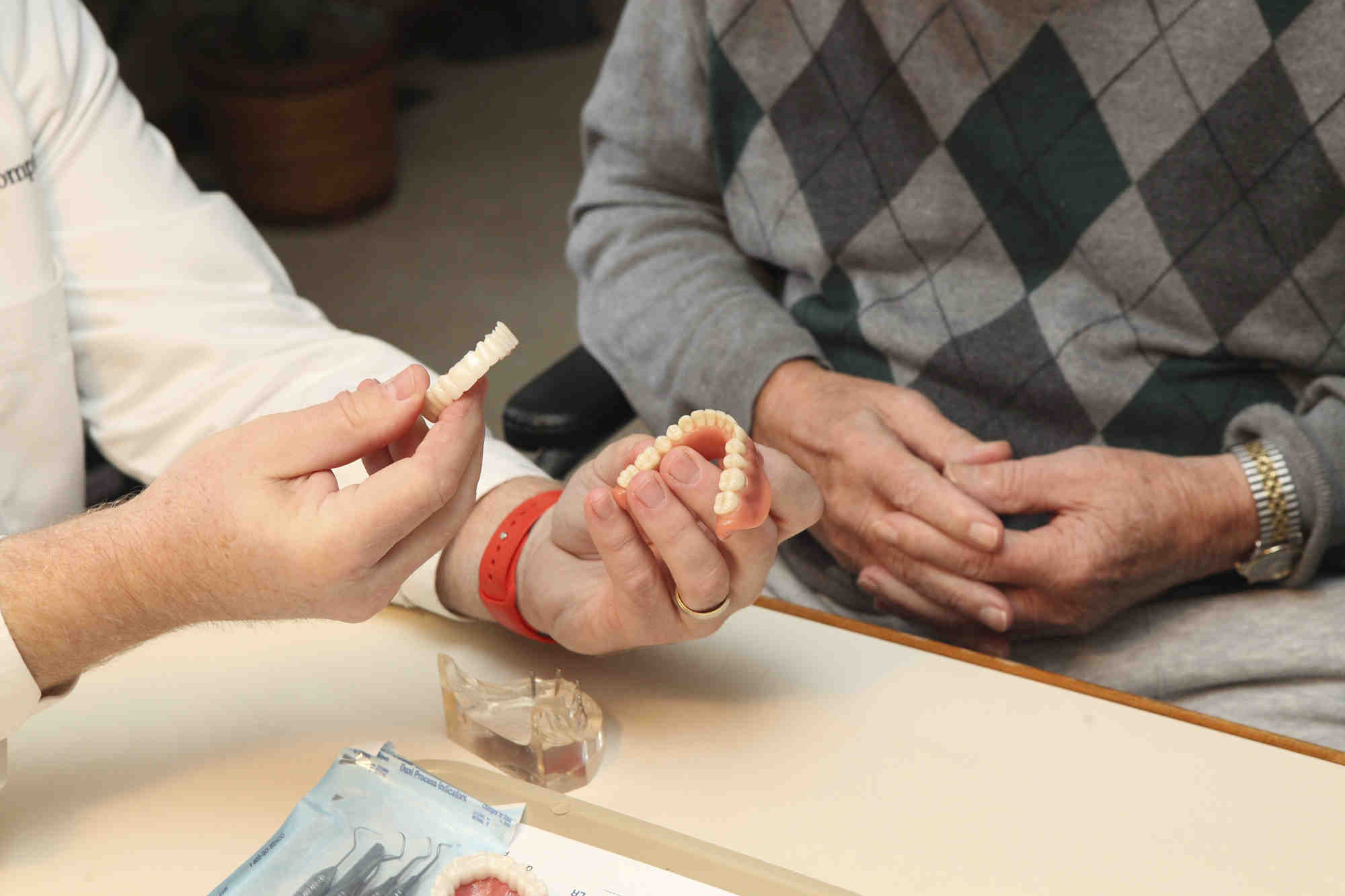 How can I get free dental implants?