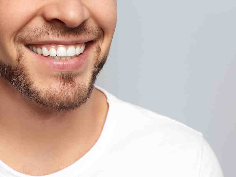 How can I get free dentures with implants?