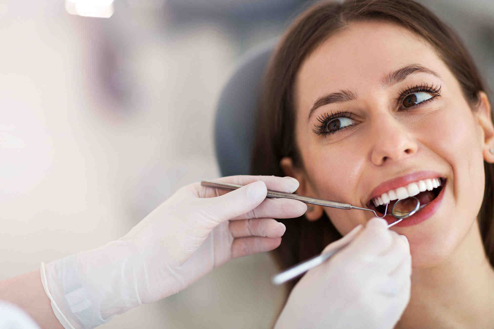 How do I choose a cosmetic dentist?