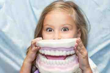 Who can help me pay for dental implants?