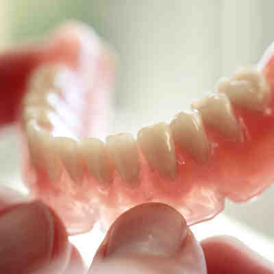 How much do implant-supported dentures cost?