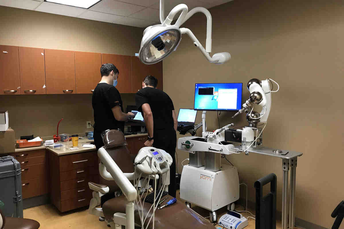 How much does a dental implant cost for one tooth?