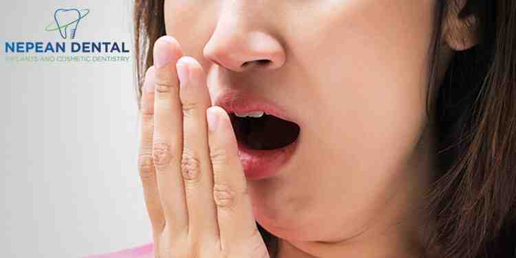 How do you get rid of bad breath between your teeth?