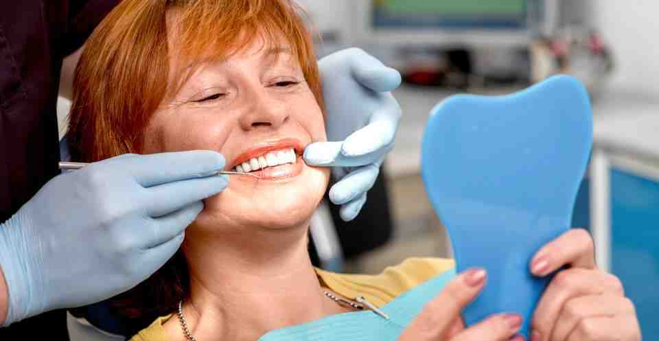 How do I choose a cosmetic dentist?