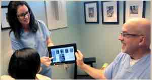 What is the going rate for dental implants?