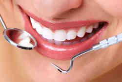 How do I become a cosmetic dentist?