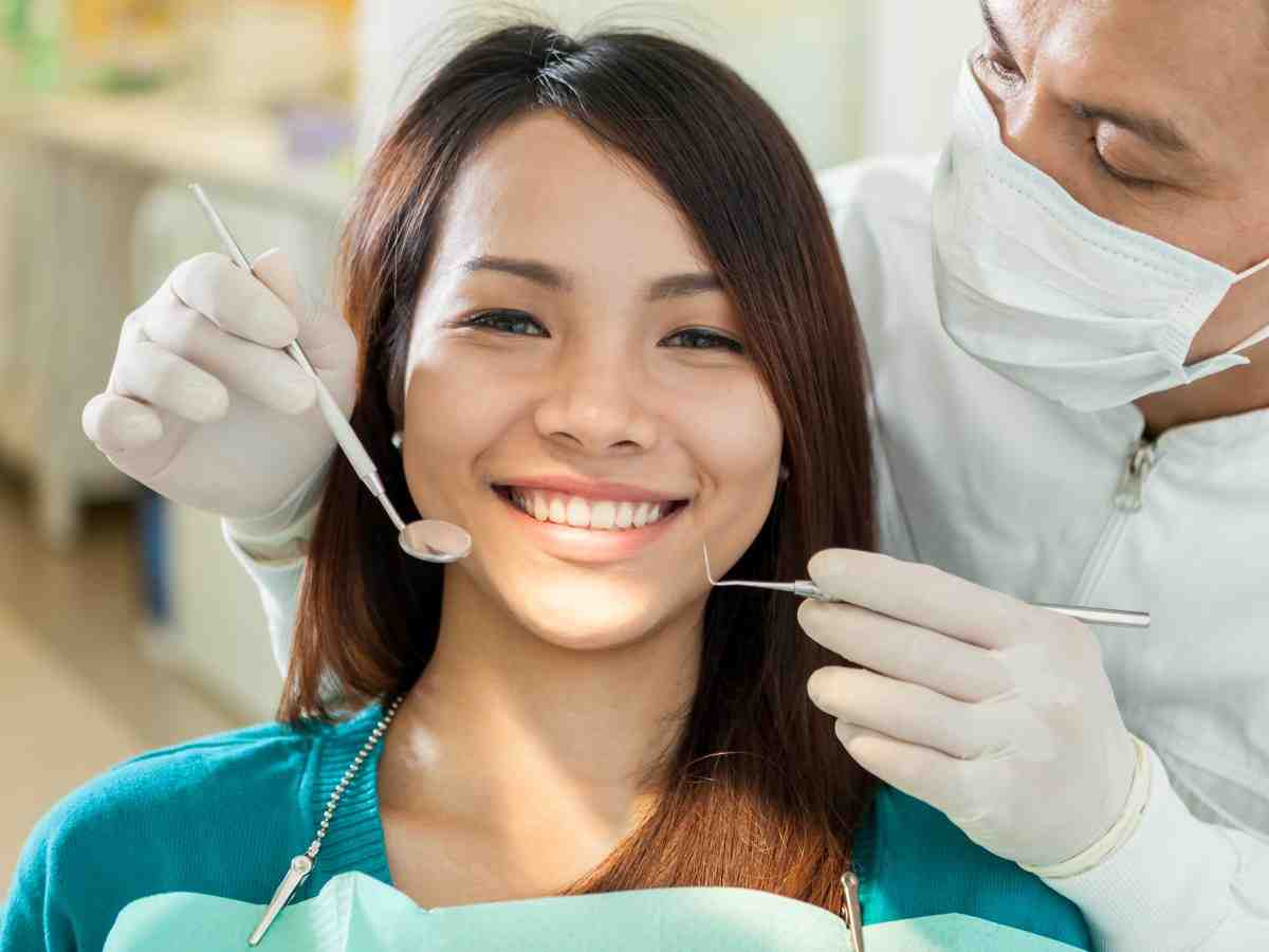 How do I find a reputable cosmetic dentist?