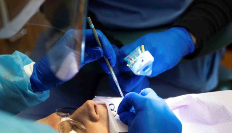 How to get your health insurance to pay for dental implants