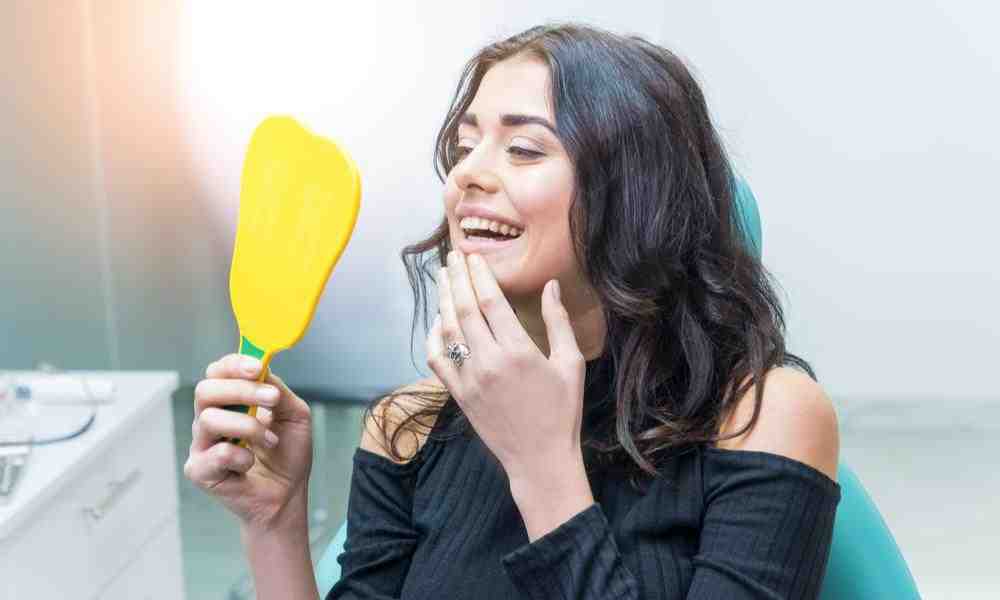 How will a dental implant benefit my oral health?