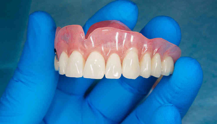 Do people with dental implants live longer than people with dentures