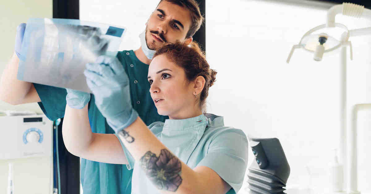 How do you know if your body is rejecting a dental implant?