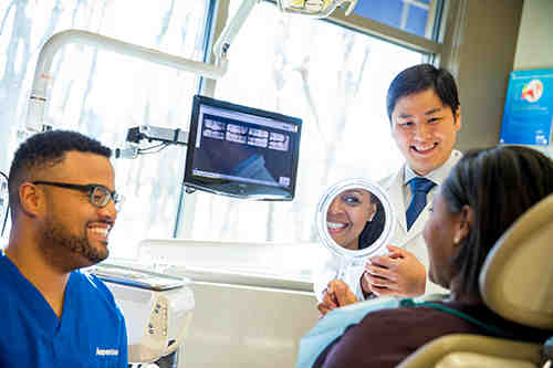 How much do mini tooth implants cost?