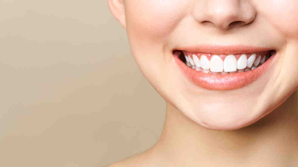 how-much-does-it-cost-to-put-a-crown-over-a-dental-implant-dental-news-network