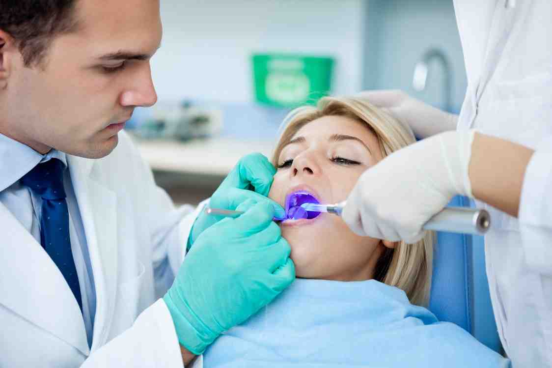 What are the negative side effects of dental implants?