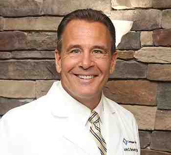 What qualifications do you need to do dental implants?