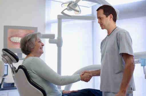 How do I find a reputable cosmetic dentist?