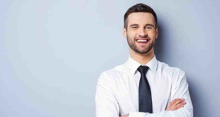 How much does a dental implant cost at a dental school?