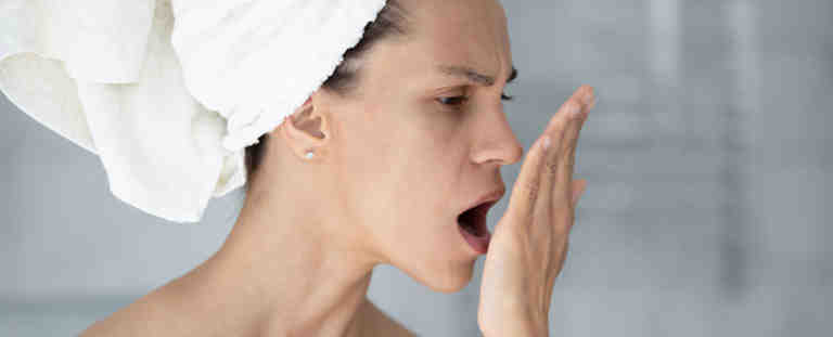 Can you brush your dentures with regular toothpaste?