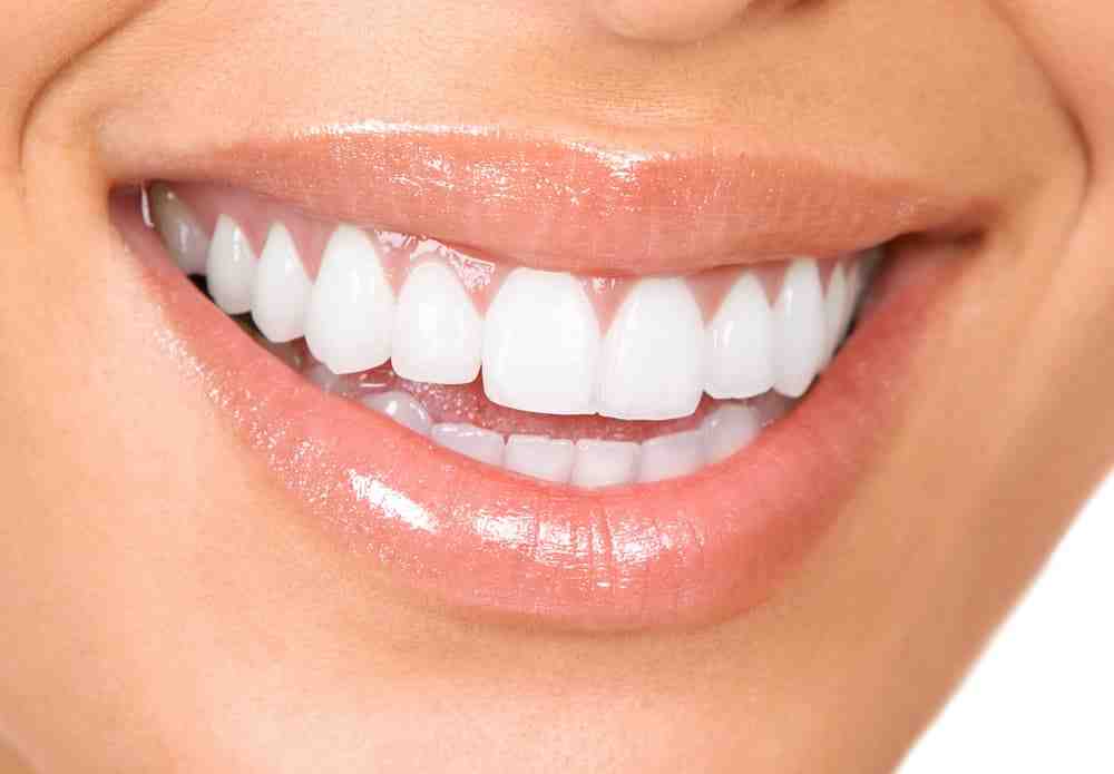 Do gums grow around implants?