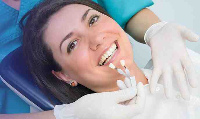 Does insurance cover tooth implant cost?