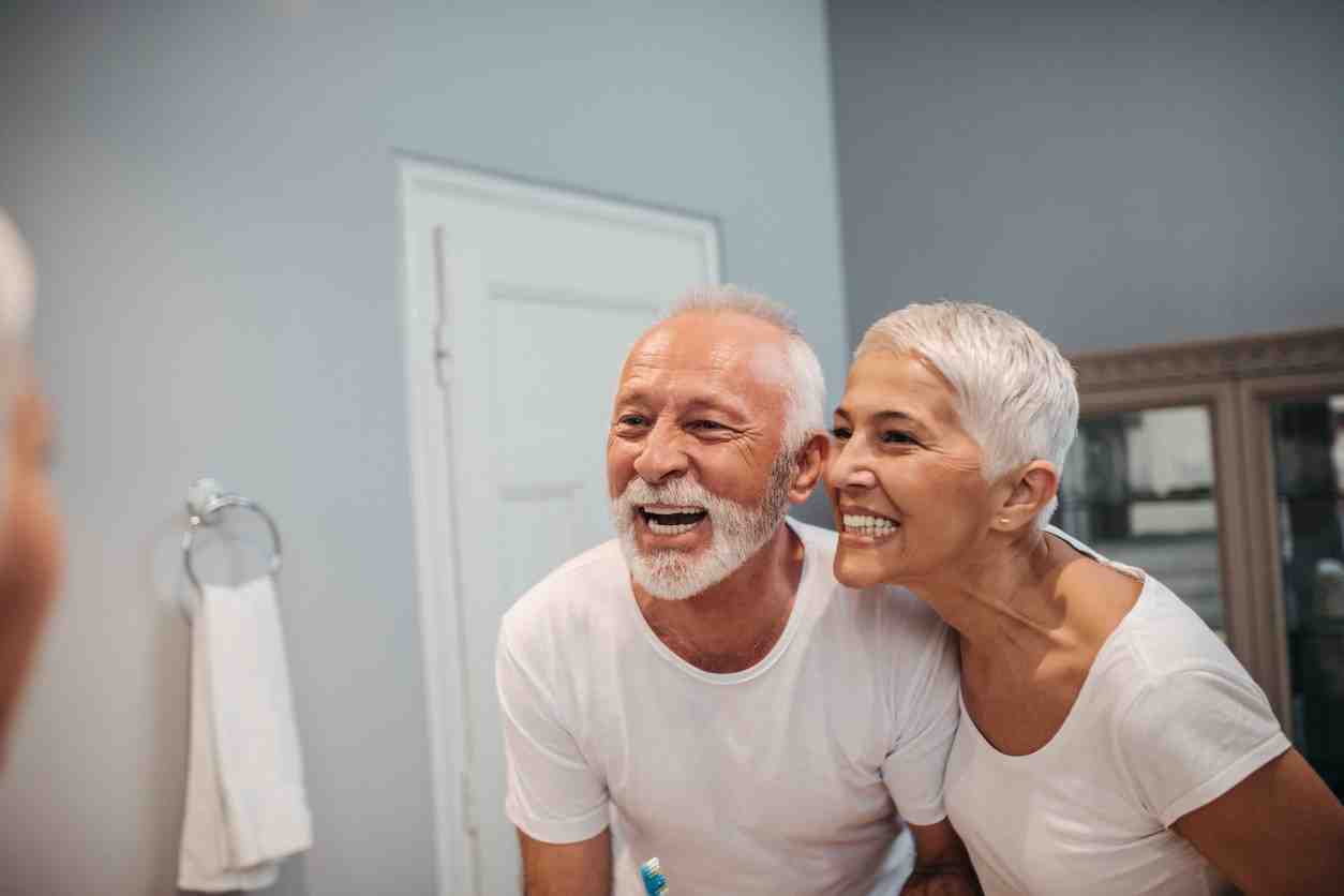 How do you clean full mouth implants?