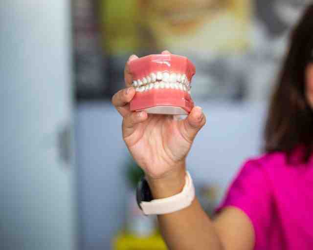 How much is a full top set of dental implants?
