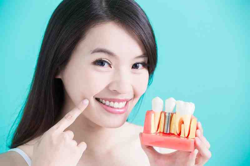 Is Waterpik safe for implants?