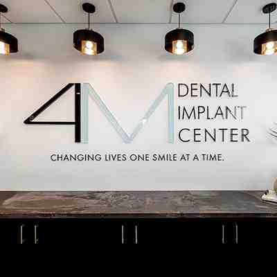 What do periodontist specialize in?