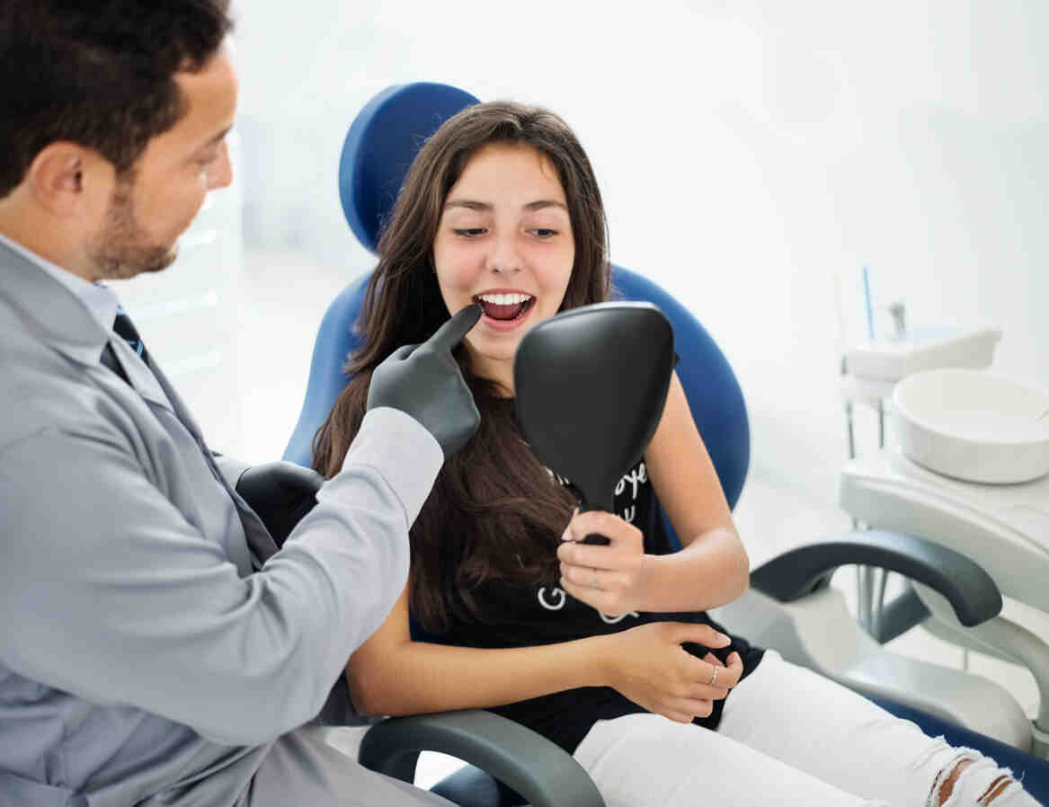 What is the downside of dental implants?