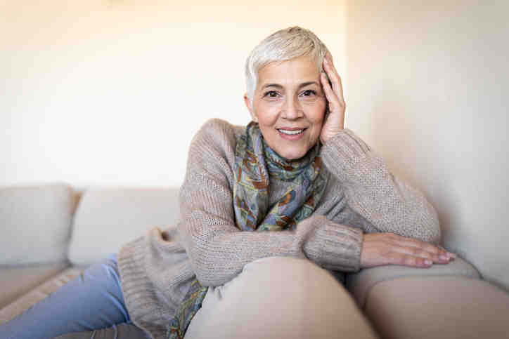 Why would a dentist recommend a partial rather than implants?