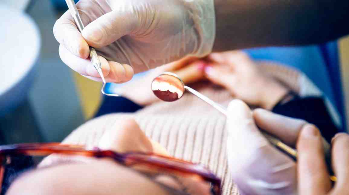 Can you brush implants with toothpaste?