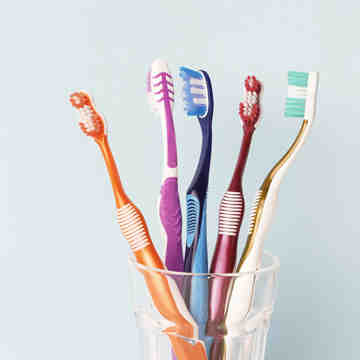 How do you remove plaque from dental implants?