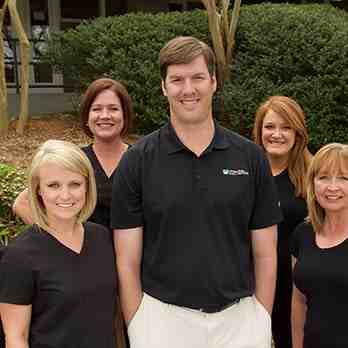 What is better root canal or implant?