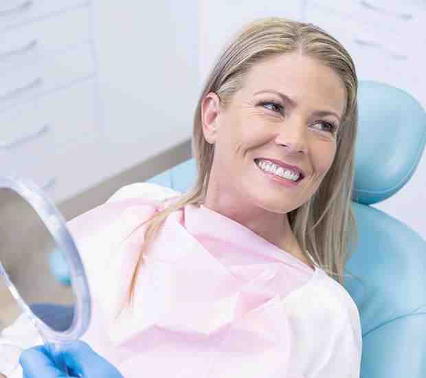 What makes dental implants medically necessary?
