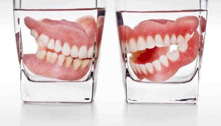 Can you sleep with dentures in?