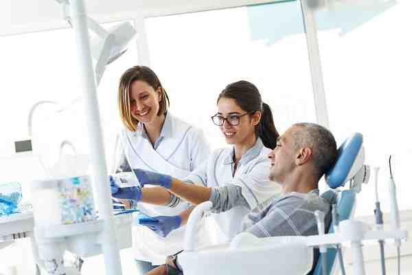 How painful is a tooth implant?