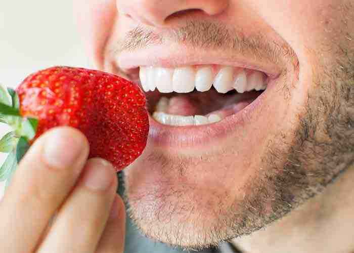 Should I rinse with salt water after bone graft?