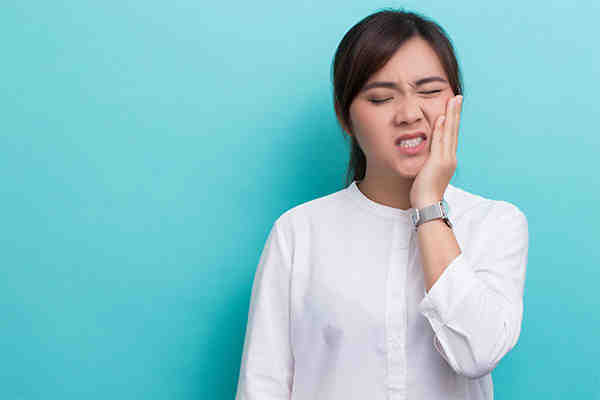 Can a root canal cause TMJ pain?