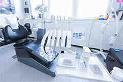 Can regular dentures be permanently attached?
