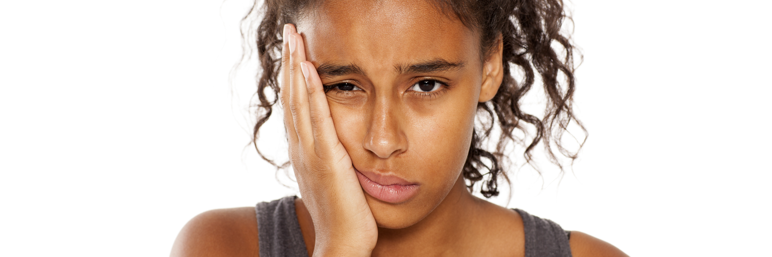 What is better root canal or implant?
