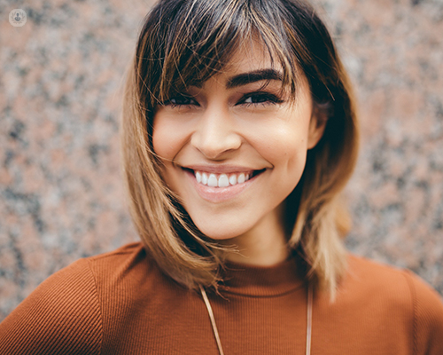 What is the difference between a cosmetic dentist and a regular dentist?